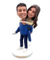 Custom cake toppers for couple bride on groom's back Custom cake toppers for couple bride on groom's back